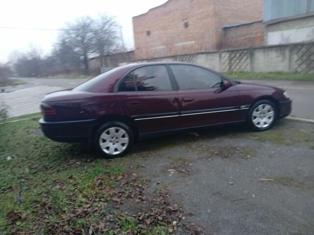 Червоний Опель Омега, об'ємом двигуна 2 л та пробігом 65 тис. км за 1550 $, фото 8 на Automoto.ua