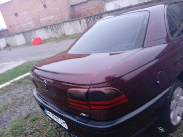 Червоний Опель Омега, об'ємом двигуна 2 л та пробігом 65 тис. км за 1550 $, фото 6 на Automoto.ua