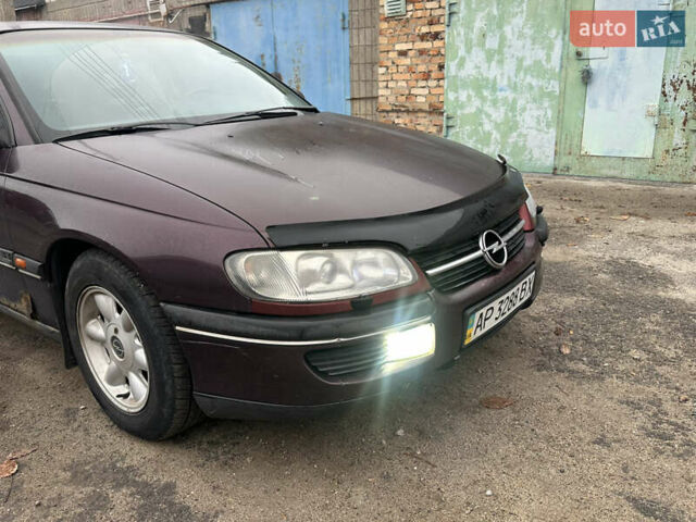 Красный Опель Омега, объемом двигателя 2.5 л и пробегом 390 тыс. км за 1800 $, фото 6 на Automoto.ua