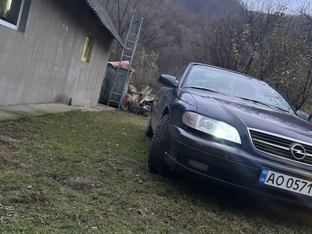 Красный Опель Омега, объемом двигателя 2 л и пробегом 330 тыс. км за 1900 $, фото 3 на Automoto.ua