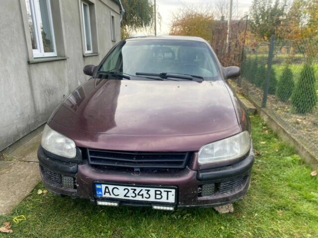 Красный Опель Омега, объемом двигателя 2.5 л и пробегом 336 тыс. км за 1100 $, фото 2 на Automoto.ua