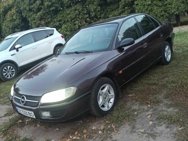 Червоний Опель Омега, об'ємом двигуна 2 л та пробігом 1 тис. км за 1350 $, фото 1 на Automoto.ua