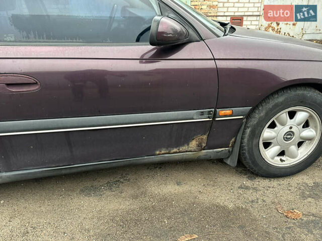 Красный Опель Омега, объемом двигателя 2.5 л и пробегом 390 тыс. км за 1800 $, фото 5 на Automoto.ua