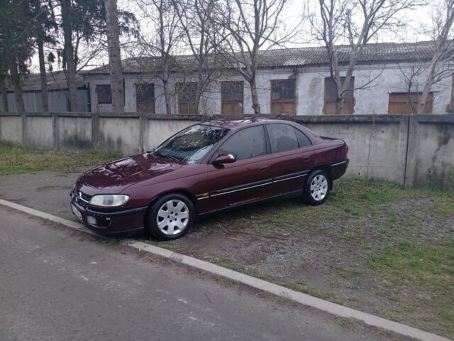Червоний Опель Омега, об'ємом двигуна 2 л та пробігом 65 тис. км за 1550 $, фото 3 на Automoto.ua