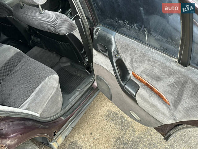 Красный Опель Омега, объемом двигателя 2.5 л и пробегом 390 тыс. км за 1800 $, фото 16 на Automoto.ua