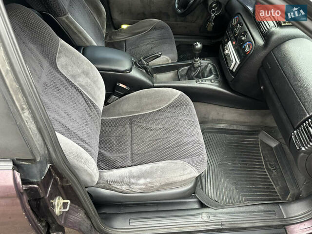 Красный Опель Омега, объемом двигателя 2.5 л и пробегом 390 тыс. км за 1800 $, фото 19 на Automoto.ua