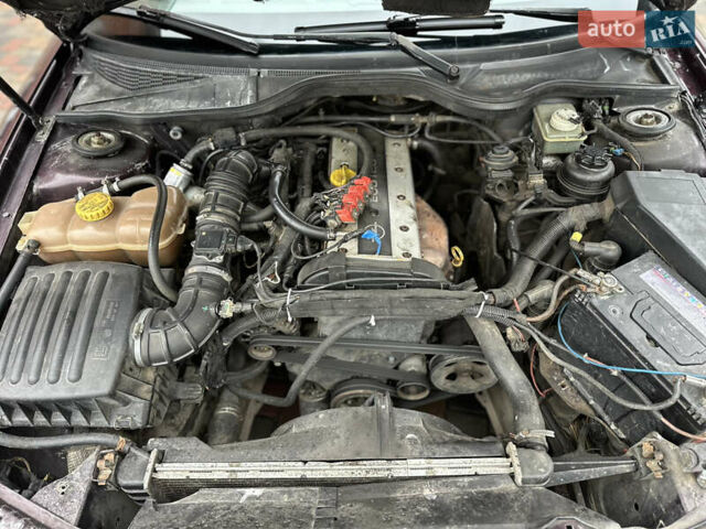 Красный Опель Омега, объемом двигателя 2 л и пробегом 301 тыс. км за 2200 $, фото 15 на Automoto.ua