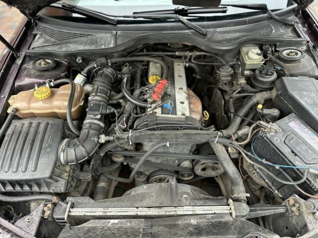 Червоний Опель Омега, об'ємом двигуна 2 л та пробігом 301 тис. км за 2200 $, фото 13 на Automoto.ua