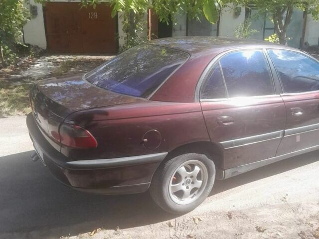 Красный Опель Омега, объемом двигателя 2 л и пробегом 140 тыс. км за 2500 $, фото 3 на Automoto.ua