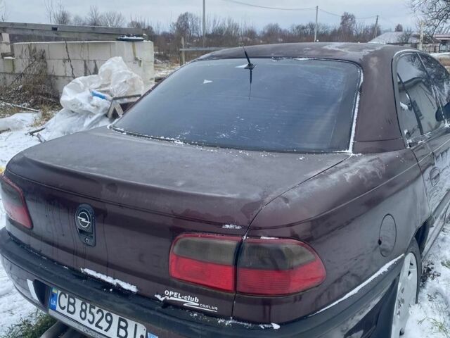 Червоний Опель Омега, об'ємом двигуна 2.5 л та пробігом 390 тис. км за 2000 $, фото 1 на Automoto.ua