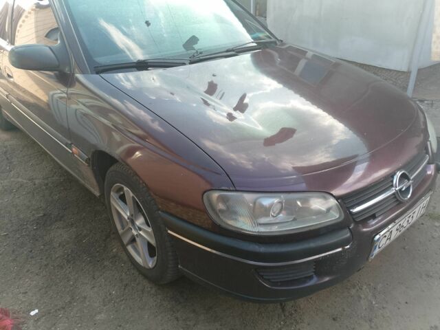 Красный Опель Омега, объемом двигателя 2 л и пробегом 591 тыс. км за 1400 $, фото 5 на Automoto.ua