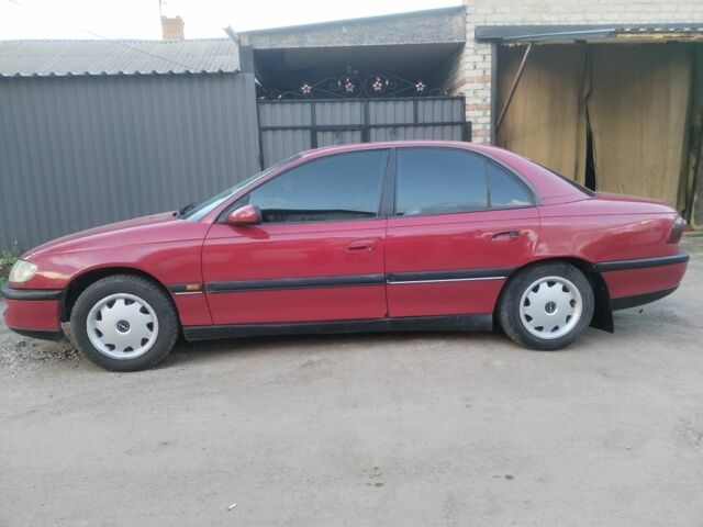 Красный Опель Омега, объемом двигателя 2 л и пробегом 250 тыс. км за 2400 $, фото 1 на Automoto.ua