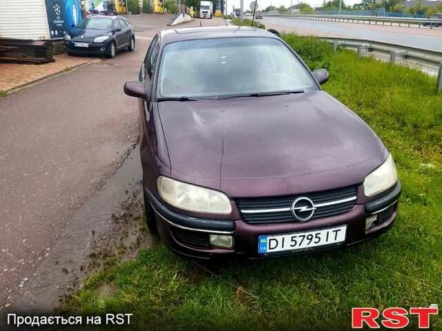 Червоний Опель Омега, об'ємом двигуна 2.5 л та пробігом 340 тис. км за 1800 $, фото 2 на Automoto.ua