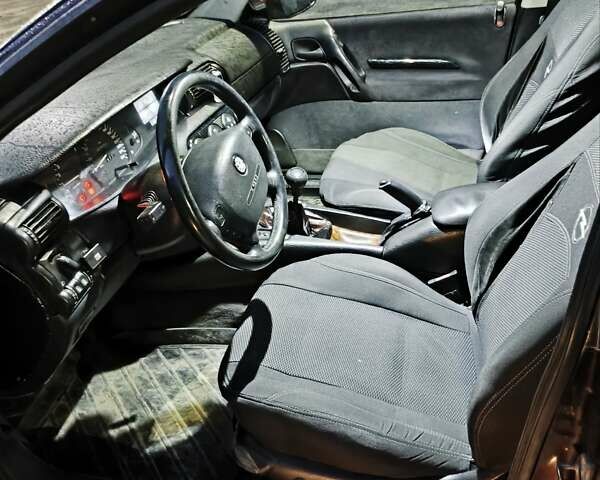 Опель Омега 1995 в Виннице на Automoto.ua Красный Опель Омега, объемом двигателя 2.5 л и пробегом 250 тыс. км за 1600 $, фото 4 на Automoto.ua