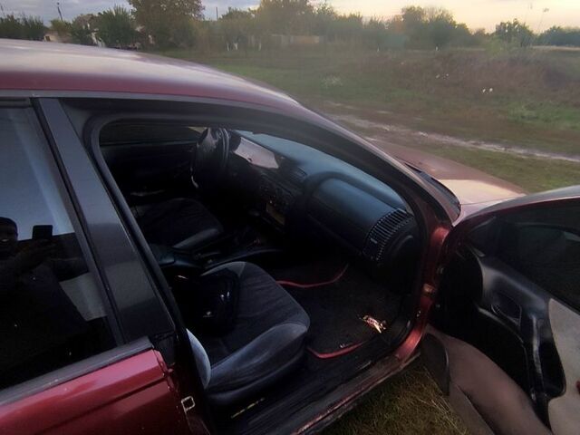 Красный Опель Омега, объемом двигателя 2 л и пробегом 326 тыс. км за 1450 $, фото 1 на Automoto.ua