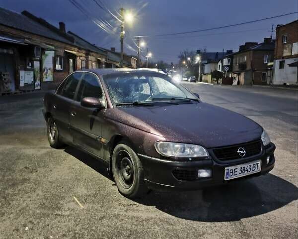 Опель Омега 1995 в Виннице на Automoto.ua Красный Опель Омега, объемом двигателя 2.5 л и пробегом 250 тыс. км за 1600 $, фото 1 на Automoto.ua