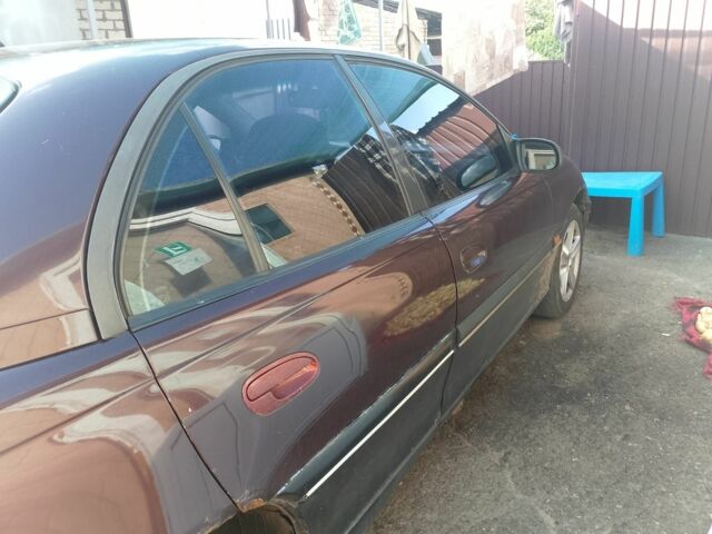 Красный Опель Омега, объемом двигателя 2 л и пробегом 591 тыс. км за 1400 $, фото 6 на Automoto.ua