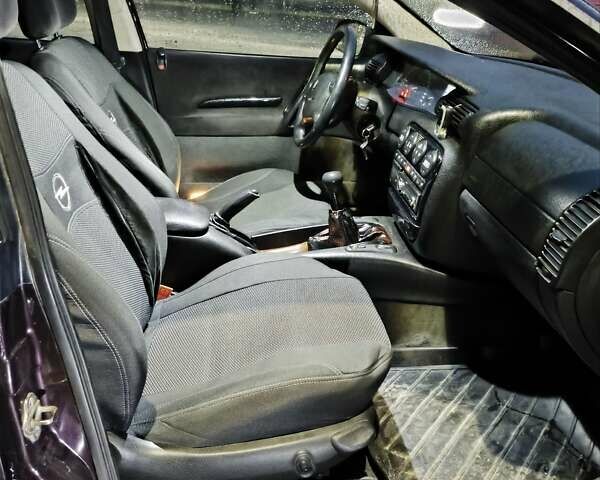 Опель Омега 1995 в Виннице на Automoto.ua Красный Опель Омега, объемом двигателя 2.5 л и пробегом 250 тыс. км за 1600 $, фото 7 на Automoto.ua