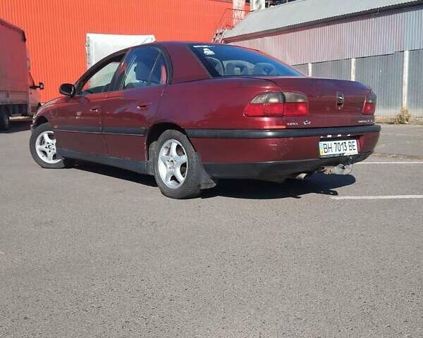 Опель Омега 1996 в Одессе на Automoto.ua Красный Опель Омега, объемом двигателя 2.5 л и пробегом 316 тыс. км за 2500 $, фото 2 на Automoto.ua