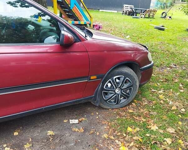 Червоний Опель Омега, об'ємом двигуна 2 л та пробігом 300 тис. км за 2200 $, фото 5 на Automoto.ua