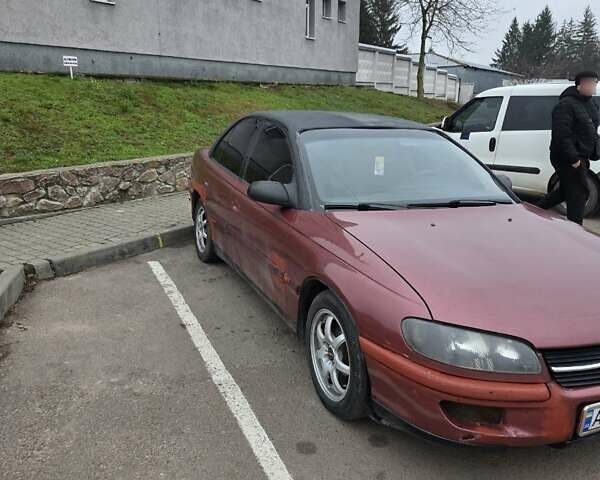 Червоний Опель Омега, об'ємом двигуна 2 л та пробігом 335 тис. км за 1750 $, фото 6 на Automoto.ua