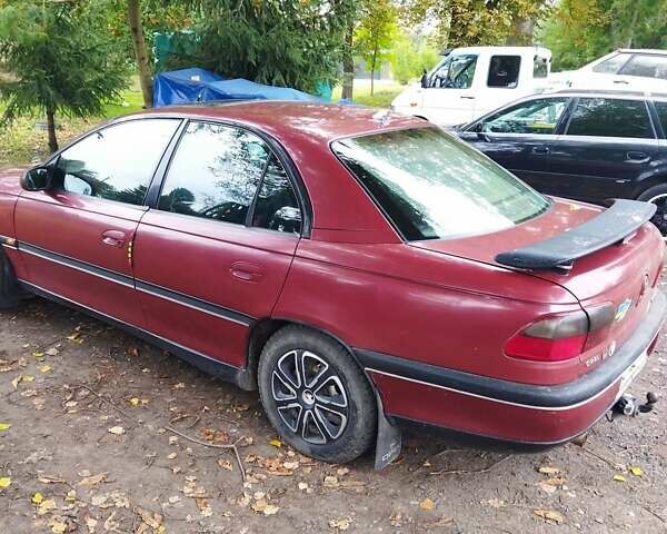 Червоний Опель Омега, об'ємом двигуна 2 л та пробігом 300 тис. км за 2200 $, фото 7 на Automoto.ua