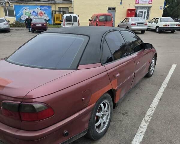 Червоний Опель Омега, об'ємом двигуна 2 л та пробігом 335 тис. км за 1750 $, фото 7 на Automoto.ua