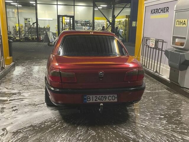 Опель Омега 1996 в Новомосковске на Automoto.ua Красный Опель Омега, объемом двигателя 2 л и пробегом 400 тыс. км за 1600 $, фото 2 на Automoto.ua