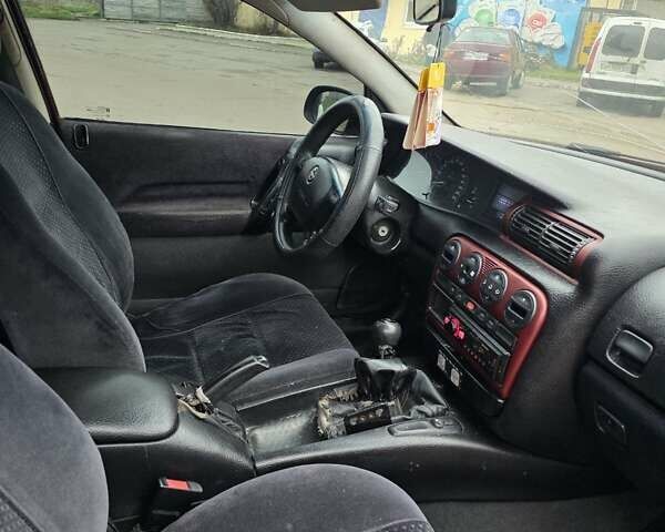 Червоний Опель Омега, об'ємом двигуна 2 л та пробігом 335 тис. км за 1750 $, фото 2 на Automoto.ua