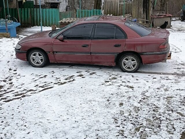 Красный Опель Омега, объемом двигателя 3 л и пробегом 420 тыс. км за 850 $, фото 1 на Automoto.ua