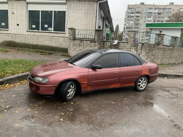 Опель Омега 1996 у Житомирі на Automoto.ua Червоний Опель Омега, об'ємом двигуна 2 л та пробігом 2 тис. км за 1400 $, фото 1 на Automoto.ua