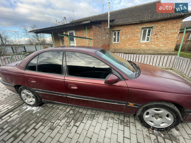 Красный Опель Омега, объемом двигателя 2 л и пробегом 193 тыс. км за 1800 $, фото 1 на Automoto.ua