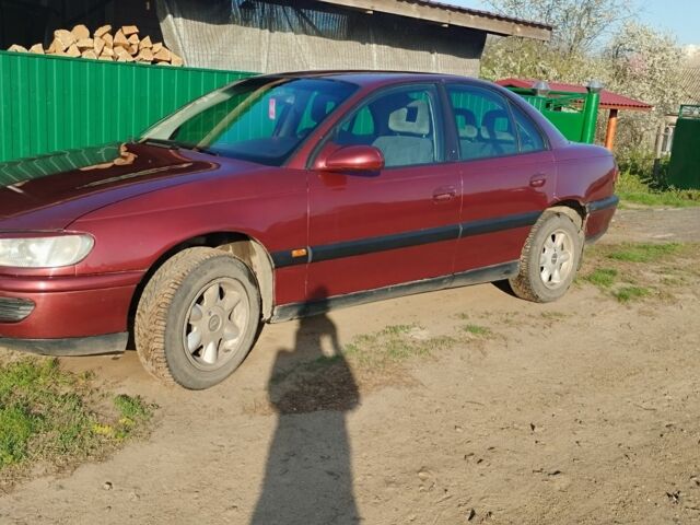Червоний Опель Омега, об'ємом двигуна 2 л та пробігом 320 тис. км за 1500 $, фото 7 на Automoto.ua