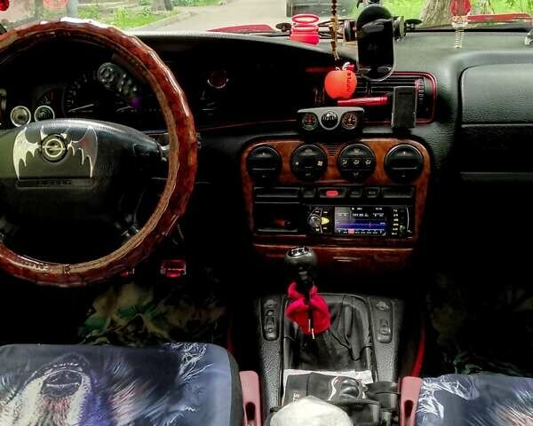 Красный Опель Омега, объемом двигателя 2 л и пробегом 100 тыс. км за 2700 $, фото 6 на Automoto.ua