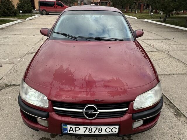 Червоний Опель Омега, об'ємом двигуна 2 л та пробігом 496 тис. км за 1800 $, фото 2 на Automoto.ua