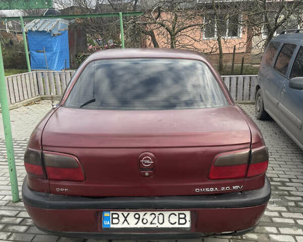 Красный Опель Омега, объемом двигателя 2 л и пробегом 193 тыс. км за 1800 $, фото 3 на Automoto.ua