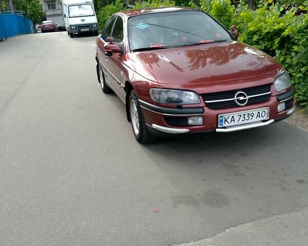 Красный Опель Омега, объемом двигателя 2 л и пробегом 100 тыс. км за 2700 $, фото 1 на Automoto.ua