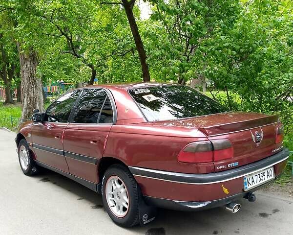 Красный Опель Омега, объемом двигателя 2 л и пробегом 100 тыс. км за 2700 $, фото 4 на Automoto.ua