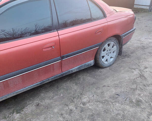 Красный Опель Омега, объемом двигателя 2 л и пробегом 240 тыс. км за 1200 $, фото 8 на Automoto.ua