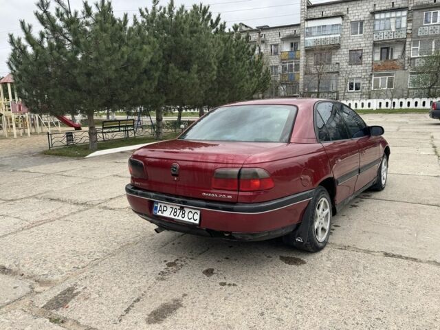Червоний Опель Омега, об'ємом двигуна 2 л та пробігом 496 тис. км за 1800 $, фото 3 на Automoto.ua