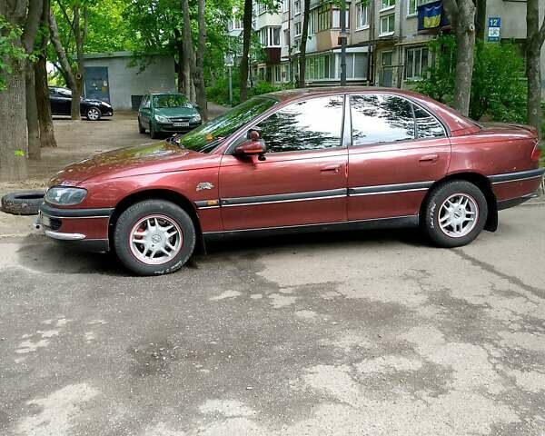 Красный Опель Омега, объемом двигателя 2 л и пробегом 100 тыс. км за 2700 $, фото 3 на Automoto.ua