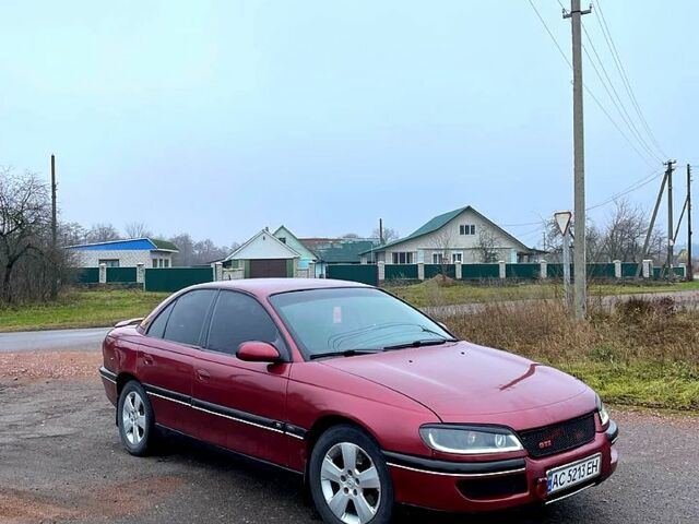Красный Опель Омега, объемом двигателя 25 л и пробегом 250 тыс. км за 2550 $, фото 2 на Automoto.ua