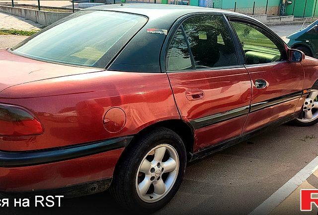 Красный Опель Омега, объемом двигателя 2 л и пробегом 428 тыс. км за 1420 $, фото 2 на Automoto.ua