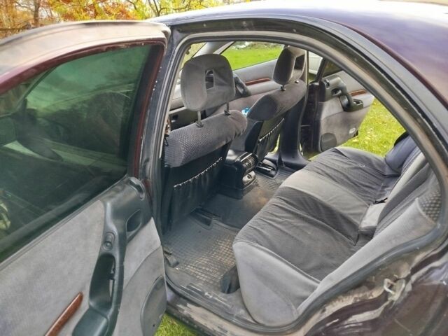 Опель Омега 1997 в Луцке на Automoto.ua Красный Опель Омега, объемом двигателя 2 л и пробегом 334 тыс. км за 2000 $, фото 5 на Automoto.ua