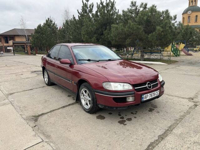 Червоний Опель Омега, об'ємом двигуна 2 л та пробігом 496 тис. км за 1800 $, фото 1 на Automoto.ua