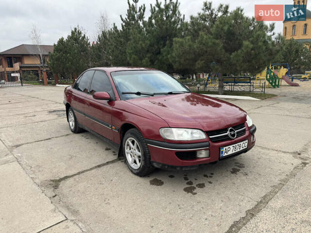 Червоний Опель Омега, об'ємом двигуна 2 л та пробігом 496 тис. км за 1800 $, фото 1 на Automoto.ua