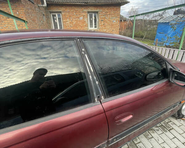 Красный Опель Омега, объемом двигателя 2 л и пробегом 193 тыс. км за 1800 $, фото 4 на Automoto.ua