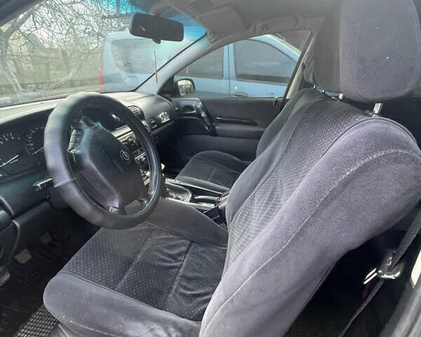 Красный Опель Омега, объемом двигателя 2 л и пробегом 193 тыс. км за 1800 $, фото 6 на Automoto.ua