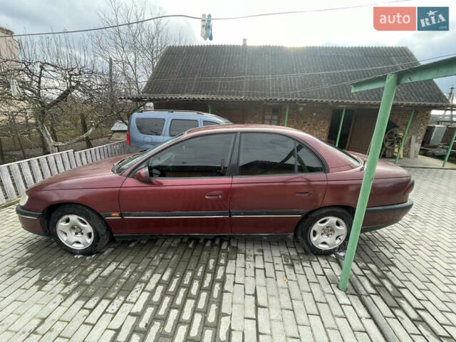 Красный Опель Омега, объемом двигателя 2 л и пробегом 193 тыс. км за 1800 $, фото 2 на Automoto.ua