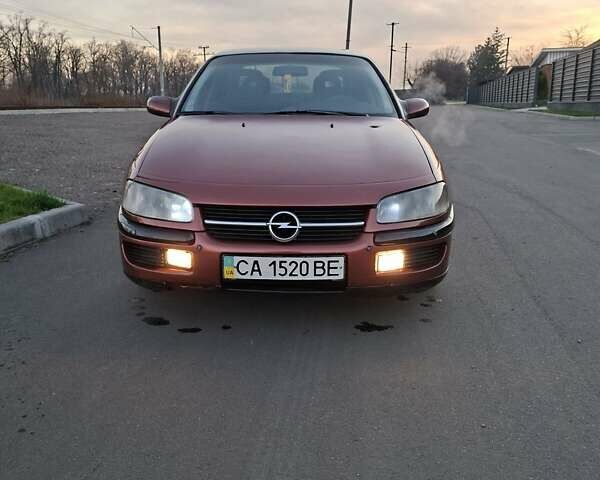 Красный Опель Омега, объемом двигателя 2 л и пробегом 400 тыс. км за 2390 $, фото 13 на Automoto.ua